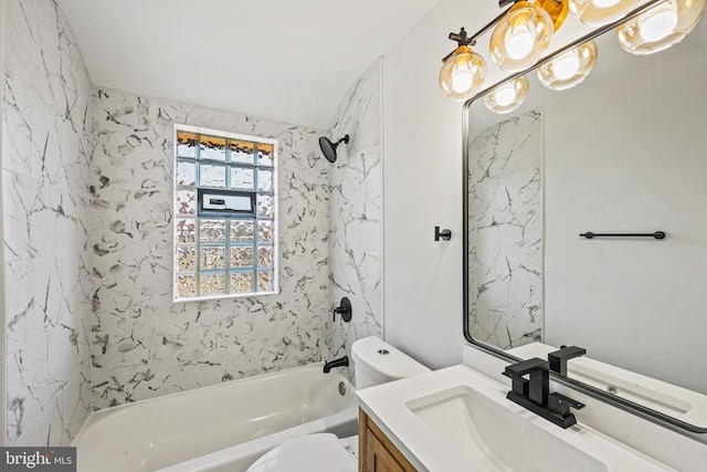 full bathroom with vanity, toilet, and tiled shower / bath combo