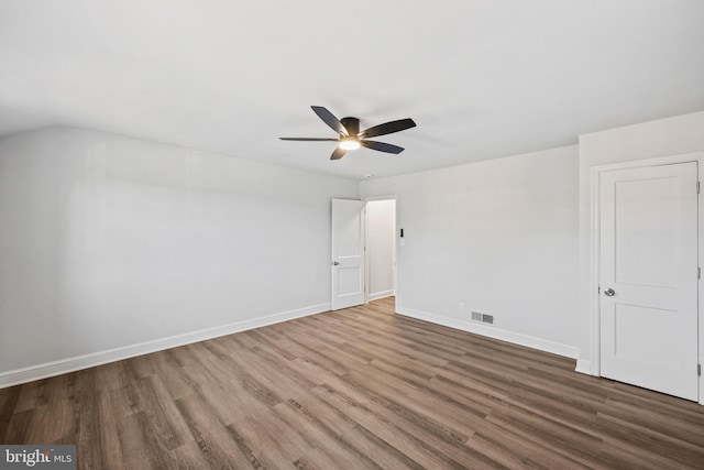 unfurnished bedroom with ceiling fan and wood-type flooring