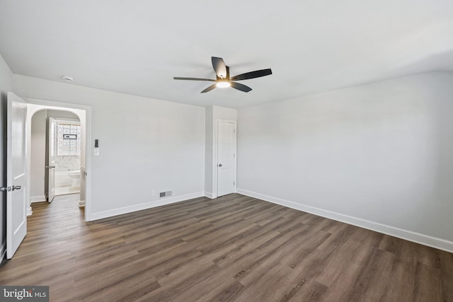 unfurnished bedroom with dark wood-type flooring and ceiling fan