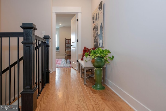 hallway with light wood-type flooring