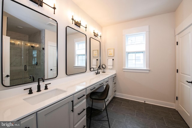 bathroom featuring vanity and walk in shower