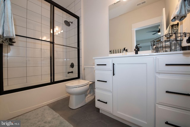 full bathroom with vanity, toilet, tile patterned flooring, and combined bath / shower with glass door