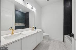 bathroom featuring vanity, toilet, and hardwood / wood-style floors