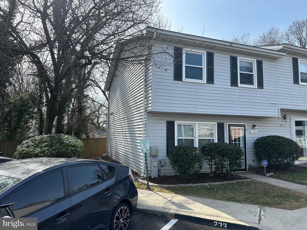 view of front of house with fence