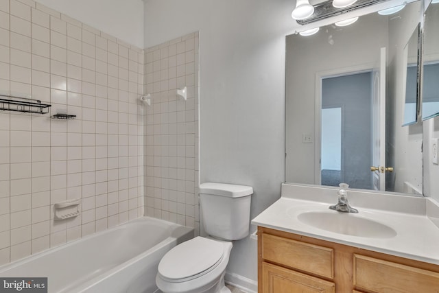 full bathroom featuring toilet, shower / bathtub combination, and vanity