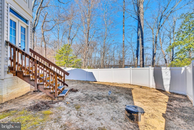 view of yard featuring a fenced backyard