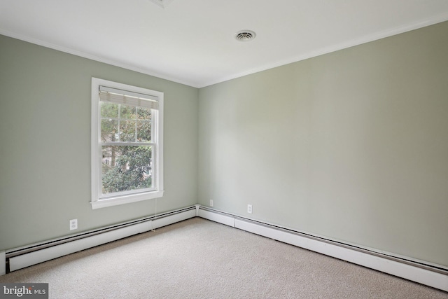 spare room with crown molding, visible vents, carpet floors, and a baseboard radiator