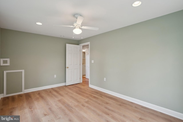 spare room with recessed lighting, baseboards, ceiling fan, and light wood finished floors