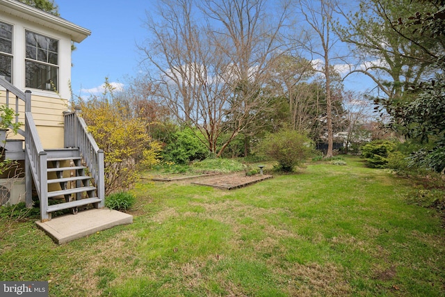 view of yard featuring stairs