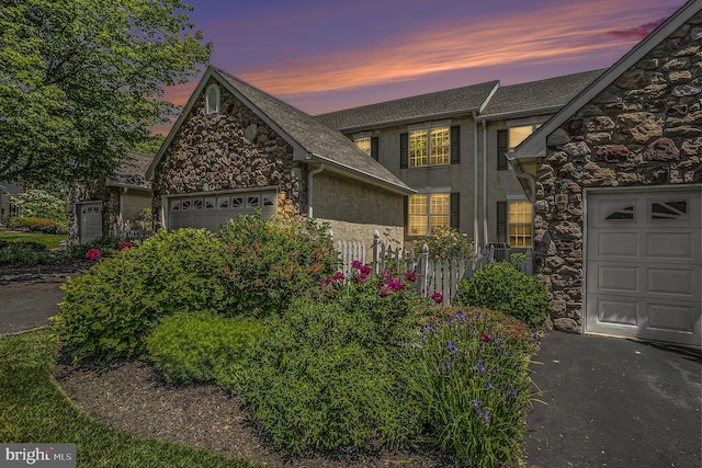 view of front of home with a garage