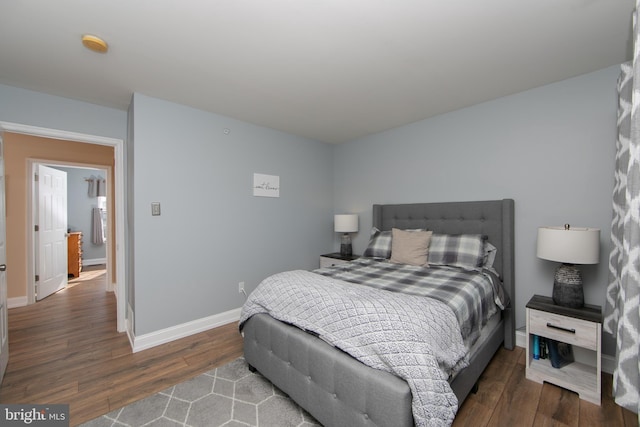 bedroom featuring dark hardwood / wood-style floors