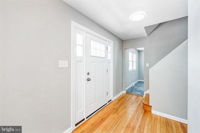 foyer featuring hardwood / wood-style floors