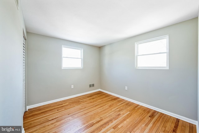 empty room featuring light wood-type flooring