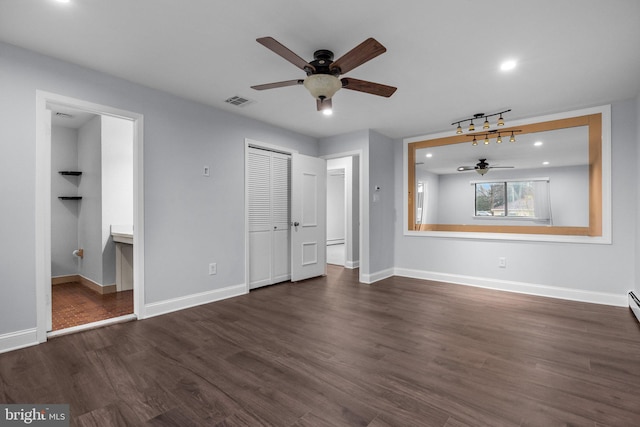 unfurnished bedroom with dark hardwood / wood-style flooring, connected bathroom, and a closet