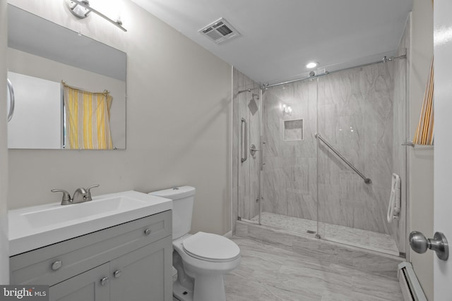 bathroom with vanity, toilet, a shower with door, and a baseboard heating unit