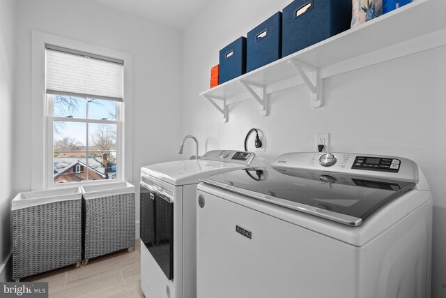 laundry area featuring laundry area and washing machine and clothes dryer