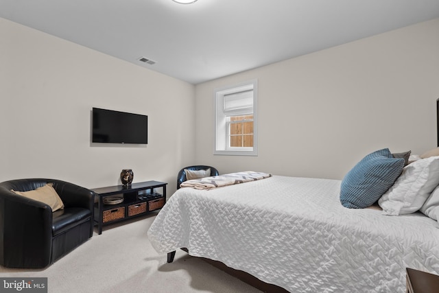 bedroom featuring carpet and visible vents