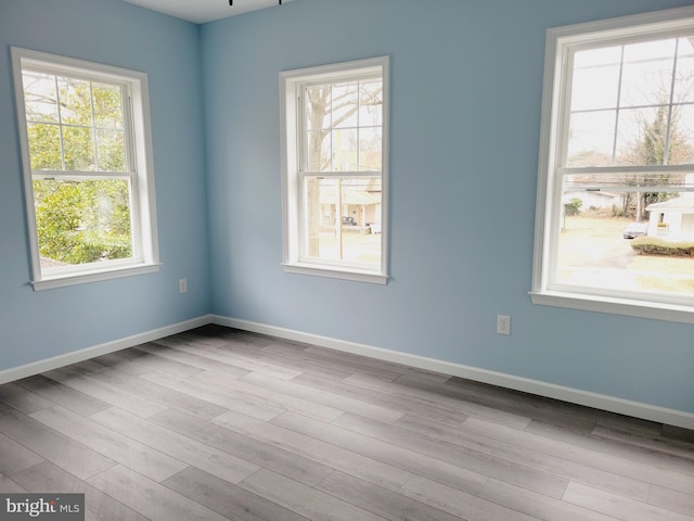 empty room featuring light hardwood / wood-style floors