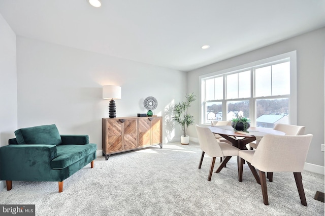 interior space featuring light carpet, recessed lighting, and baseboards