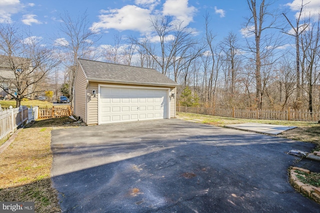 detached garage with fence