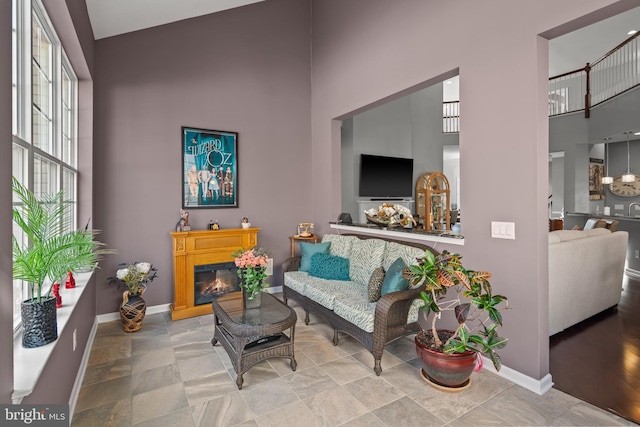 sitting room with a high ceiling