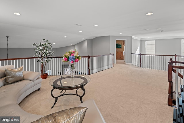 sitting room with light colored carpet