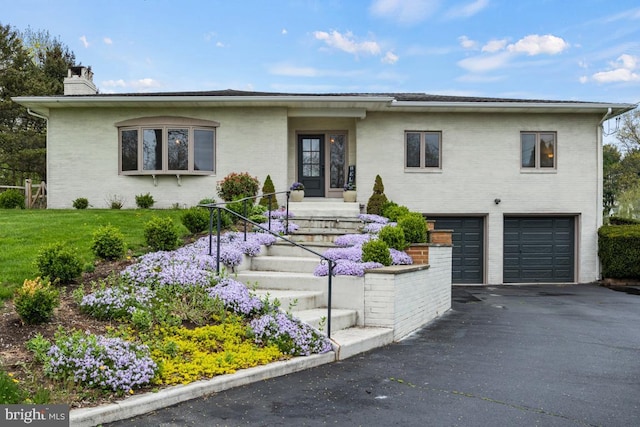 view of front of house with a garage