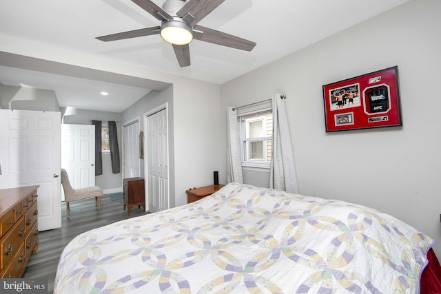 bedroom with dark wood finished floors, a ceiling fan, and recessed lighting