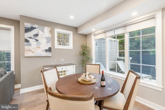 dining room featuring light hardwood / wood-style flooring