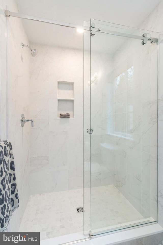 bathroom with walk in shower