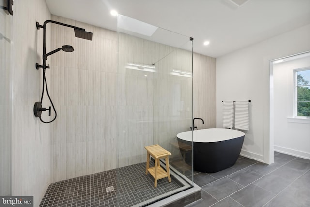 bathroom with plus walk in shower and tile patterned floors