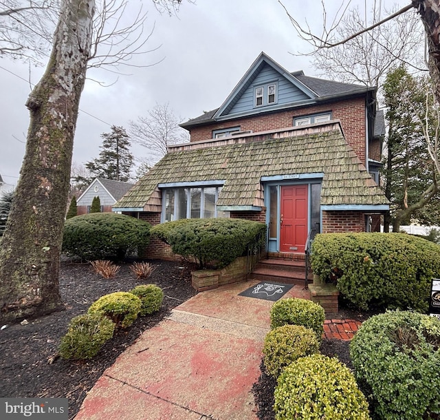 view of front of house featuring brick siding