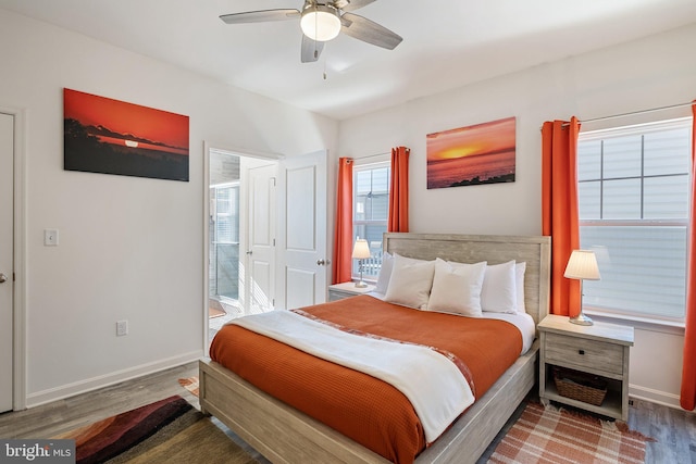 bedroom featuring dark wood-type flooring and ceiling fan