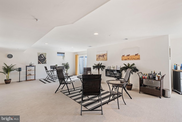 view of carpeted dining area