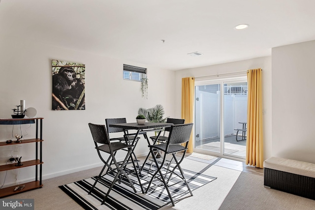 dining space with plenty of natural light