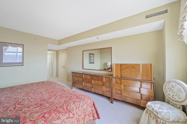 bedroom with carpet and visible vents