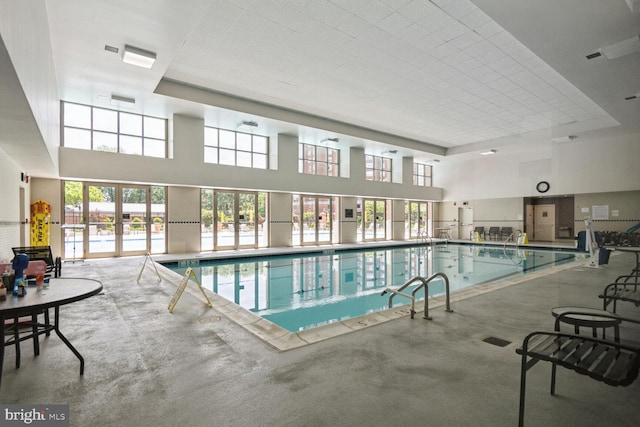 pool featuring french doors