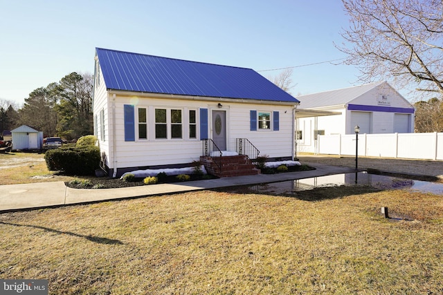 view of front facade with a front lawn