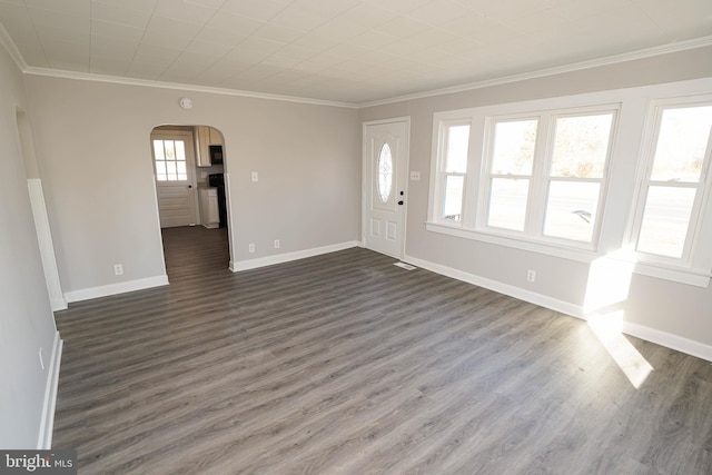 entrance foyer featuring crown molding and dark wood-type flooring