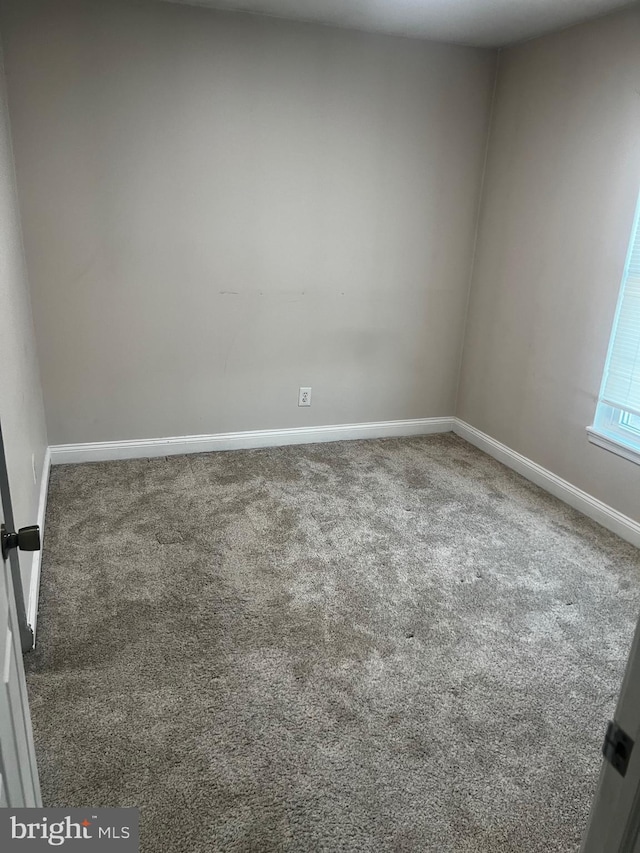 empty room with carpet floors