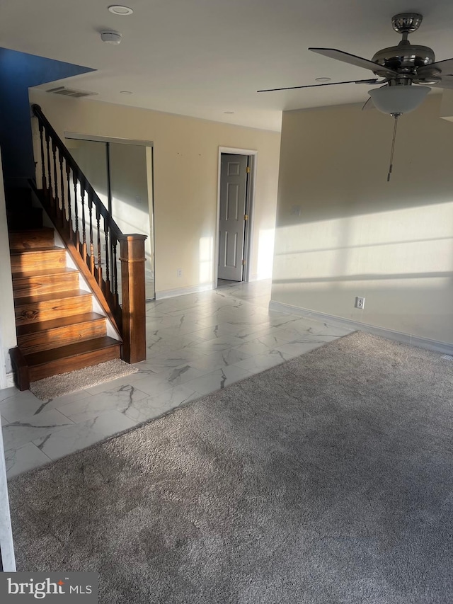 unfurnished room featuring ceiling fan