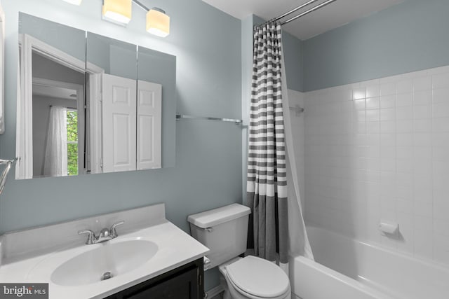 full bathroom with shower / tub combo, vanity, and toilet