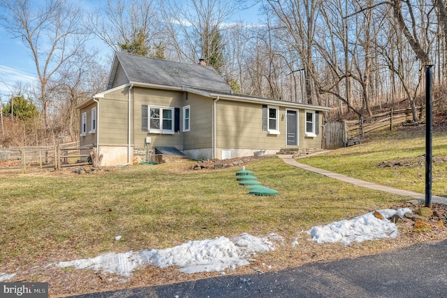 view of front of home with a front yard