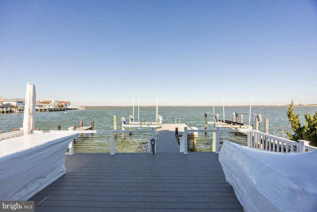 view of dock with a water view