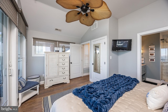 bedroom featuring dark wood-type flooring, vaulted ceiling, and ceiling fan