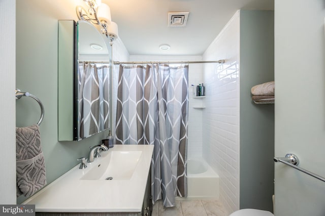 full bathroom featuring vanity, shower / bathtub combination with curtain, and toilet