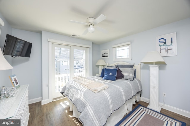 bedroom featuring dark wood-type flooring and ceiling fan