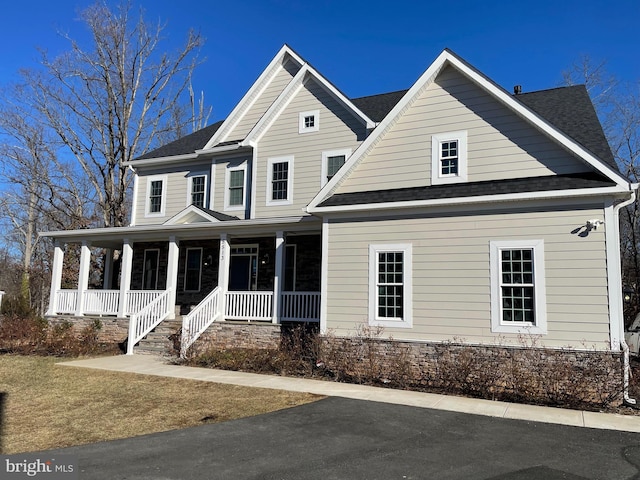 craftsman-style home featuring covered porch