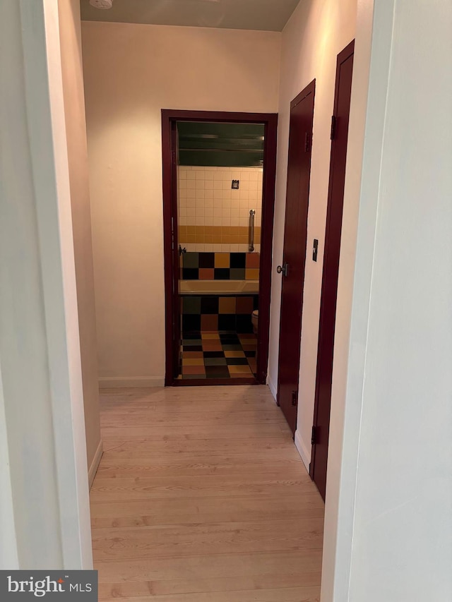 hallway featuring light hardwood / wood-style floors