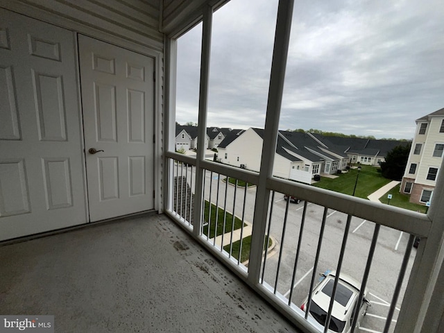 balcony featuring a residential view